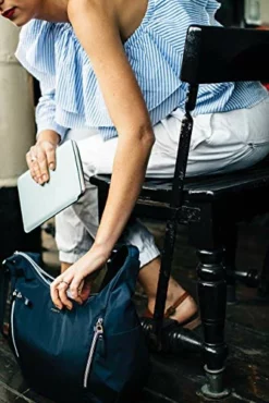 Pacsafe Women's Stylesafe 10L Anti Theft Convertible Crossbody, Navy Blue -Cole Haan Shop 51lF5jDXHML